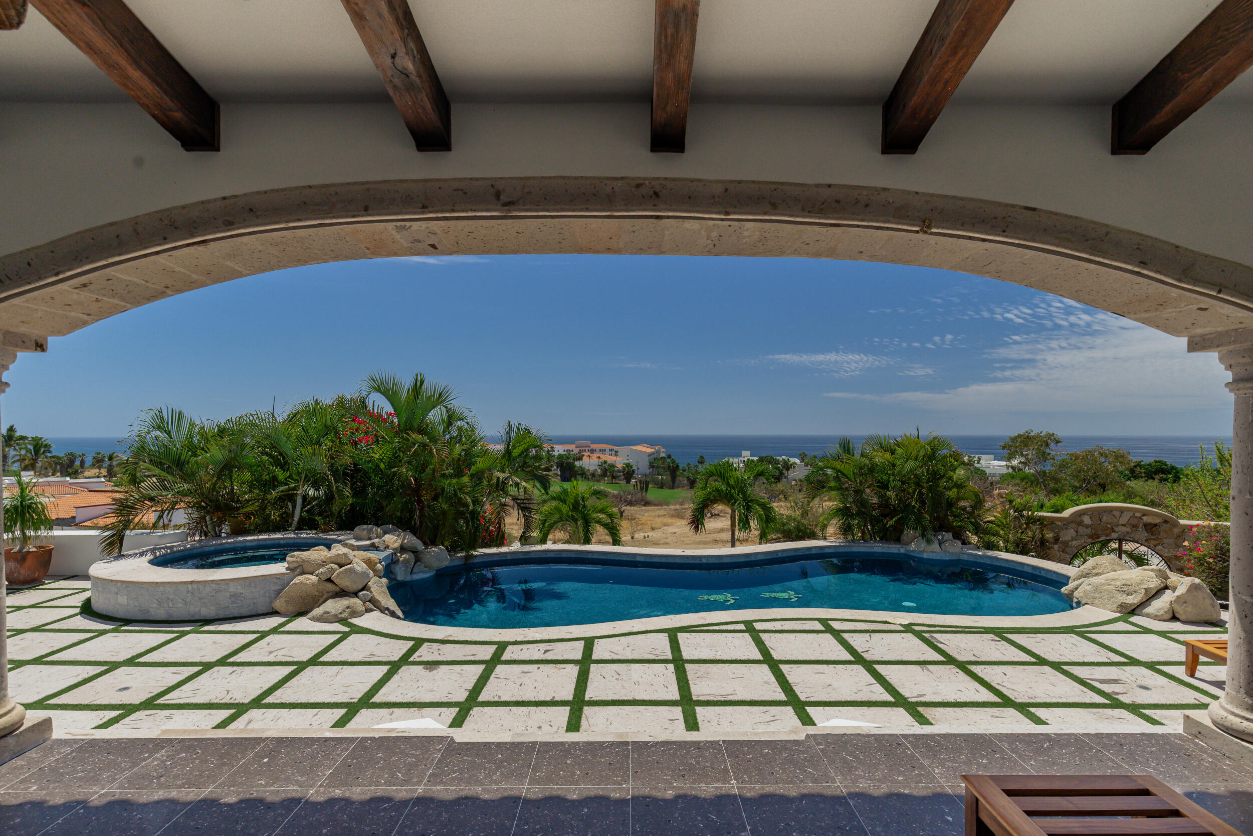 Querencia Section 4- Las Canadas Discover refined indoor-outdoor living at Cañada 9, set within Querencia, San Jose del Cabo's premier private golf community. Soaring beamed ceilings, walls of pocket glass, and luminous marble floors define an open great room that flows effortlessly to the terrace, infinity-edge pool, and stone-clad water feature -- all framed by panoramic Sea of Cortez and mountain for sale