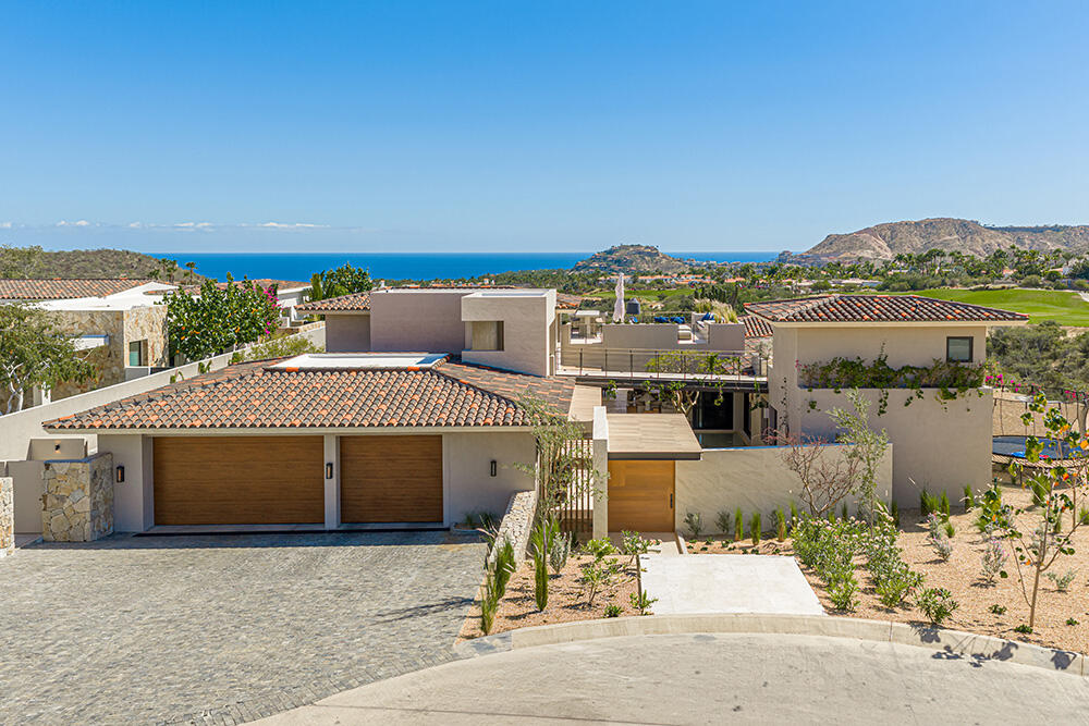 Querencia Section 22f- La Montana Set within the prestigious private community of Querencia, this striking contemporary estate sits on a 19,407 sq ft homesite and offers approximately 8,600 sq ft of refined indoor-outdoor living. Enjoy panoramic ocean for sale