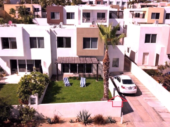 Querencia El Tule-Inland:General Great opportunity!! Beautiful turnkey home ideal for a couple or small family.Originally designed as a 3-bedroom home, the downstairs bedroom was opened up to create a TV room/family room. However, it can easily be closed off again and converted back into a third bedroom if desired.The home also offers space to build a third bathroom and a walk-in closet for the primary bedroom, adding even more comfort and value to the property.Enjoy a cozy front yard, perfect for children to play or for relaxing outdoors in the sunshine. The community also features a common area with a swimming pool, bathrooms, and BBQ area.Located in a secure gated community with 24/7 security, this home offers an excellent location between Cabo San Lucas and San José del Cabo, just minutes from Chilen – Villas del Mar, San Jose Corridor, BS