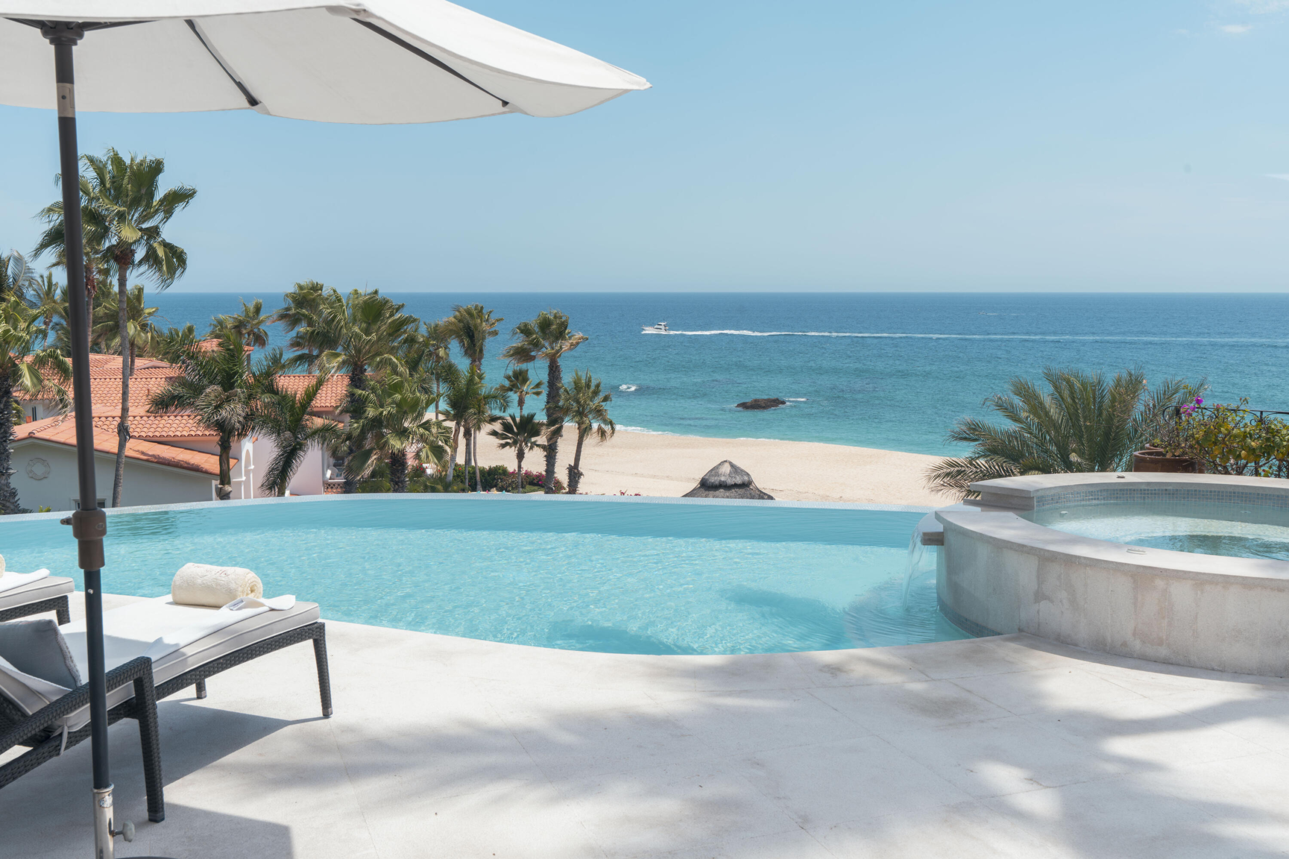 Querencia Section 18- Horizontes Welcome to Horizontes 3, an exquisite custom-made home located within San José del Cabo's most sought-after community, Querencia. Surrounded by Tom Fazio's signature golf course, recognized as one of the best in the country, this stunning residence is just a short golf cart ride from the prestigious 5-star Club House. This remarkable 6-bedroom, 6.5-bathroom home elevates luxury living with a fresh vision of architecture and design. The layout features a cozy family room, an expansive bunk bed bedroom on the lower level, and a spacious maid's quarters with an independent entrance, making it ideal for entertaining family and friends.The property boasts outdoor living spaces, including tranquil green areas, an outdoor kitchen, an infinity pool, a jacuzzi, and ocean and ravine for sale