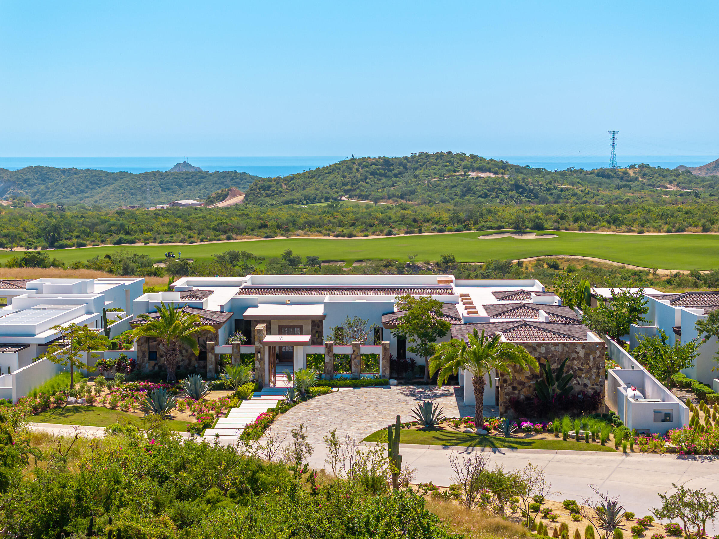 Querencia Section 10- El Parque Discover this exceptional new residence perfectly situated within the sought-after El Parque neighborhood of Querencia. Ideally located just a short walk from the clubhouse, this home offers the best of convenience and community living.Enjoy a large green space directly in front of the property, ideal for families with children or pets to play and explore. The setting captures beautiful golf course, mountain, and ocean for sale