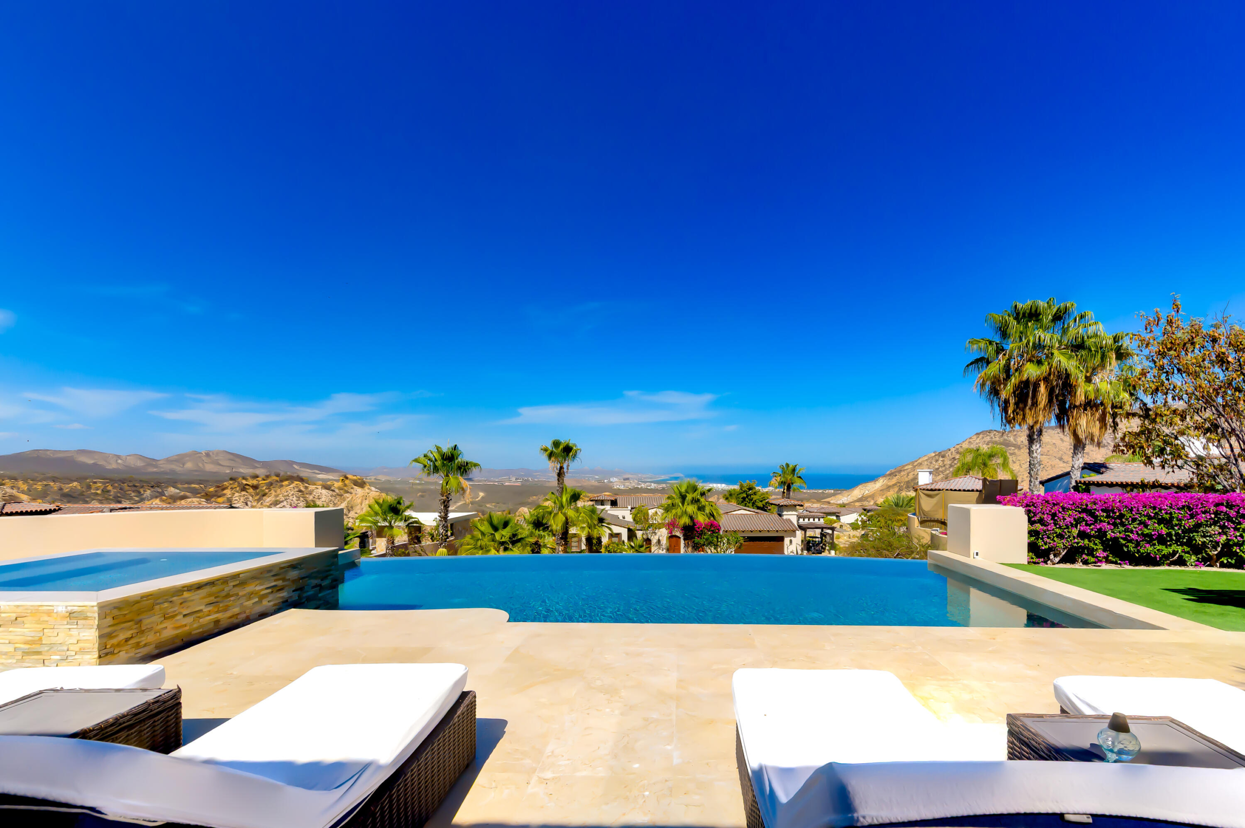 Querencia Section 4- Las Canadas Discover refined indoor-outdoor living at Cañada 9, set within Querencia, San Jose del Cabo's premier private golf community. Soaring beamed ceilings, walls of pocket glass, and luminous marble floors define an open great room that flows effortlessly to the terrace, infinity-edge pool, and stone-clad water feature -- all framed by panoramic Sea of Cortez and mountain for sale